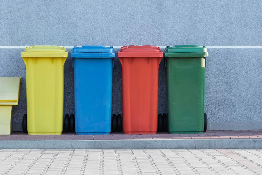 Colorful trash and recycling bins