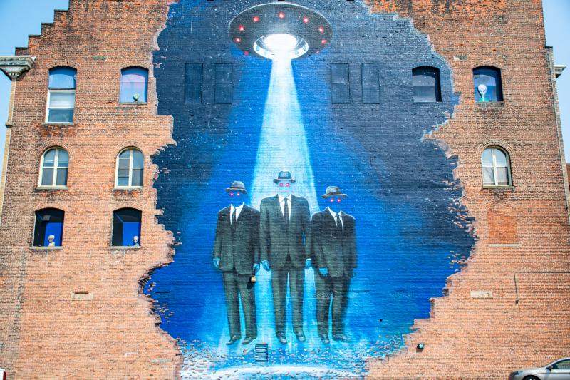 Photo of the Men in Black mural, located in Downtown Bridgeport
