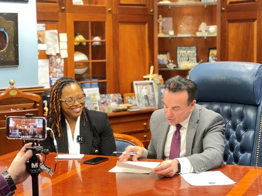 Photo of City Attorney, Tyisha S. Toms, and Mayor Ganim sitting inside of Mayor Ganim's office